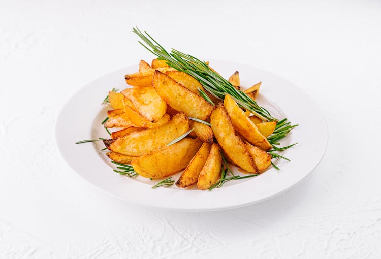 Potato wedges baked with rosemary