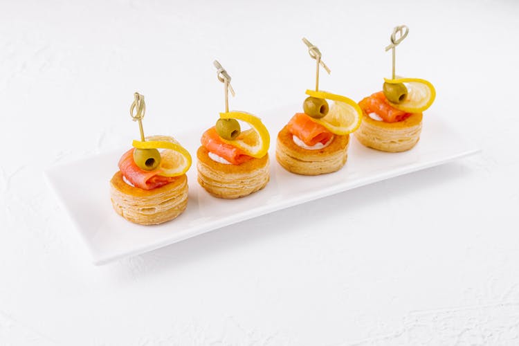 Tartlet with buko cream, lightly salted salmon, lemon and olive
